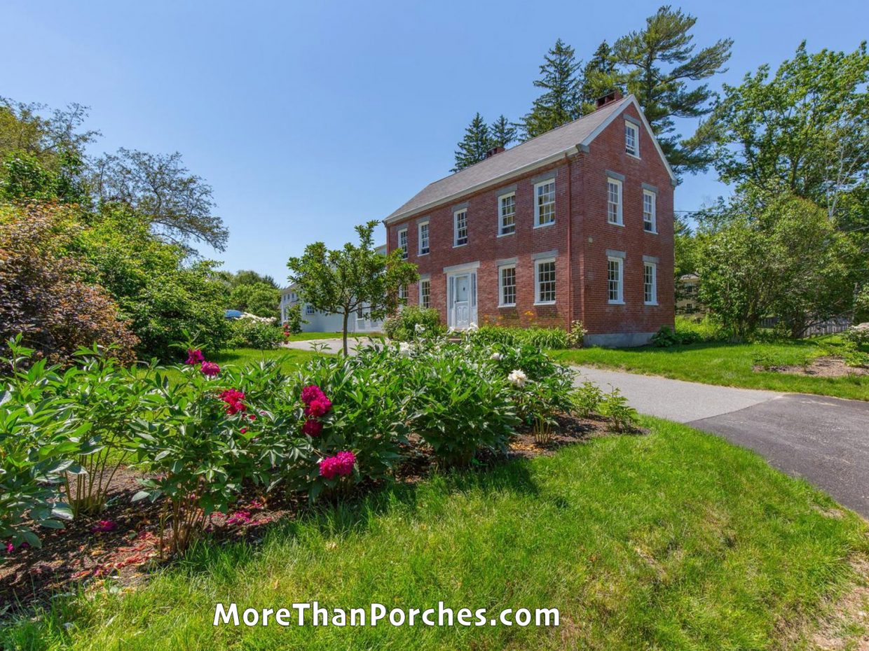 red_brick_house_flower_hedges